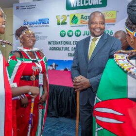 CS Kagwe interacts with cultural performers at the Agritec Africa opening ceremony.