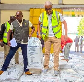 NCPB staff and officials oversee fertilizer handling at the Eldoret depot.