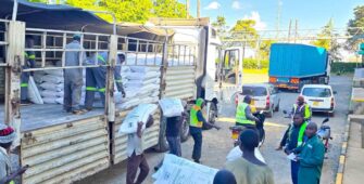 Trucks carrying top-dressing fertilizer arrive at the National Cereals and Produce Board depot in Eldoret.